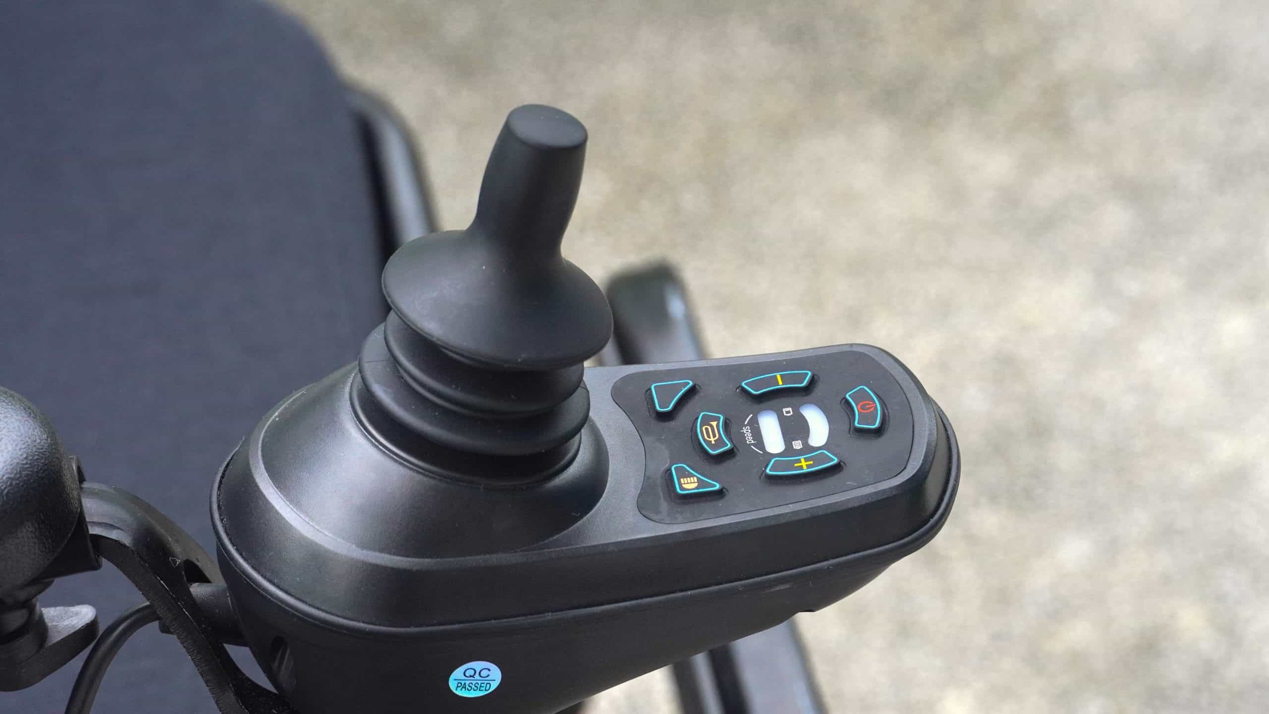 mwheel rs joystick scaled - Press Release: Comparing the MWHEEL RS & Carbon RS – MOBOT’s Premiere Motorised Electric Wheelchairs for Effortless Mobility